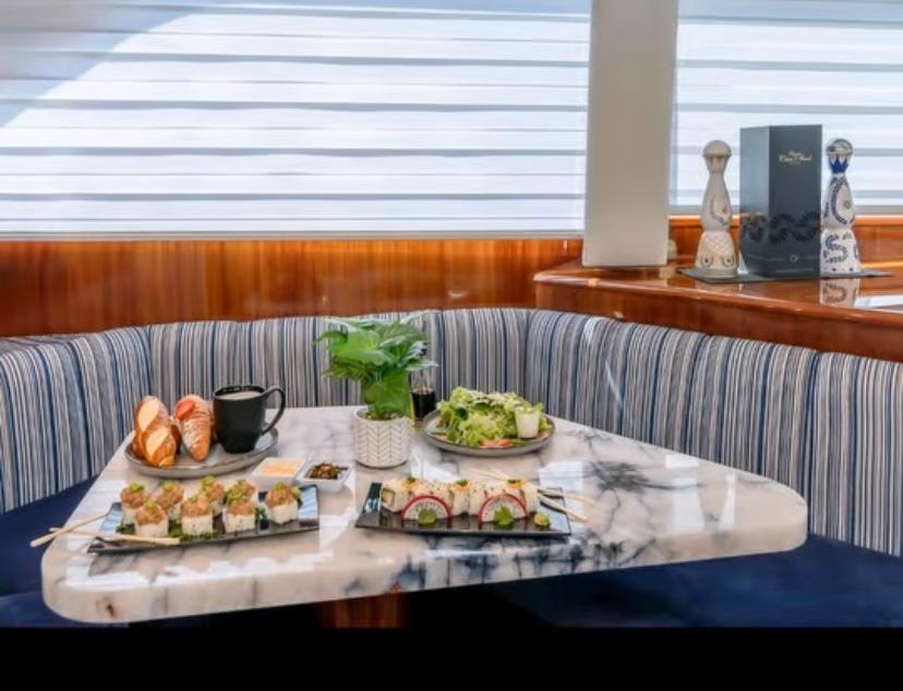 Luxury interior dining with fresh sushi aboard TCB